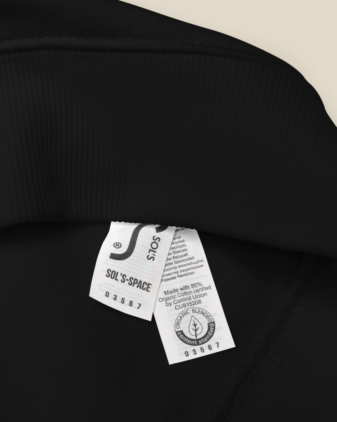 Gros plan sur le sweatshirt Algérie olivier qalbi – détail molleton