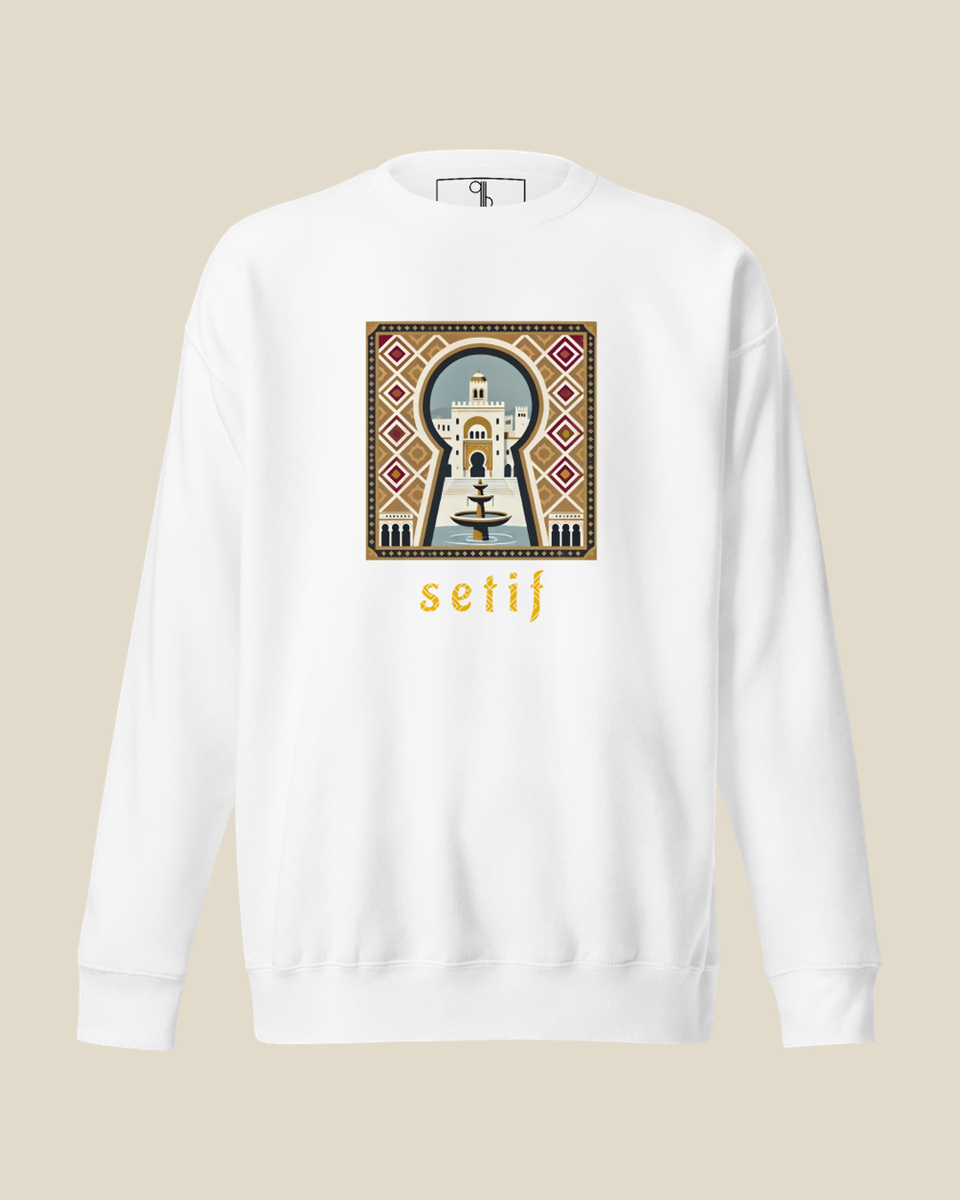 Sweatshirt Sétif Key blanc qalbi vue de face, clé ornée et fontaine de Sétif imprimées sur la poitrine